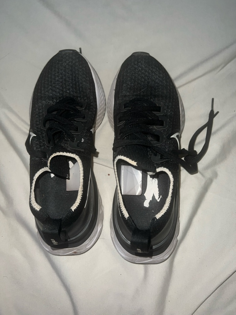 Nike Black and White Flyknit Women's Athletic Running Shoes - Picture 2 of 5
